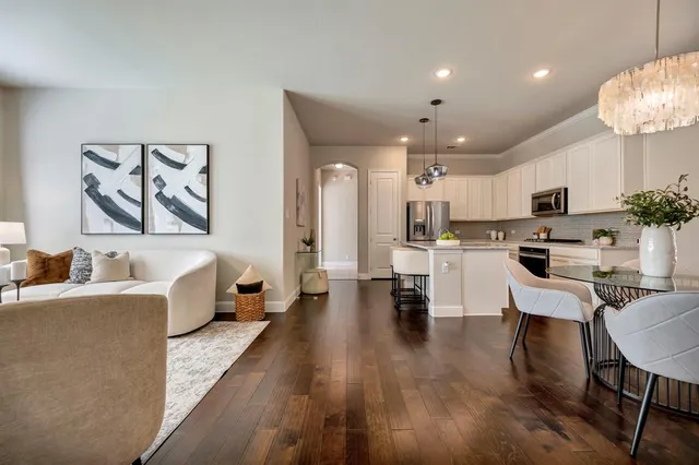 a living room with furniture and a table
