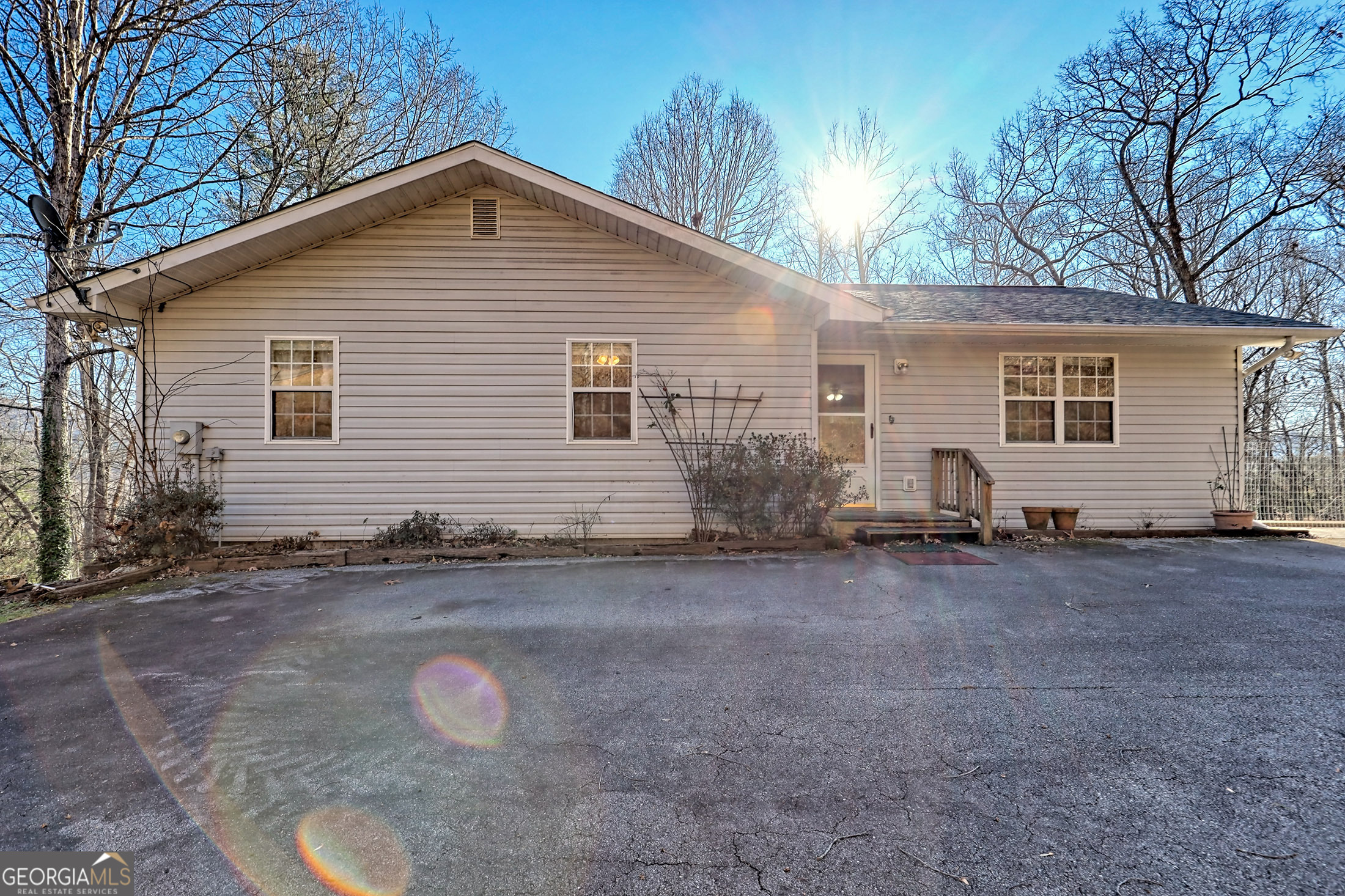 a view of a backyard with a house