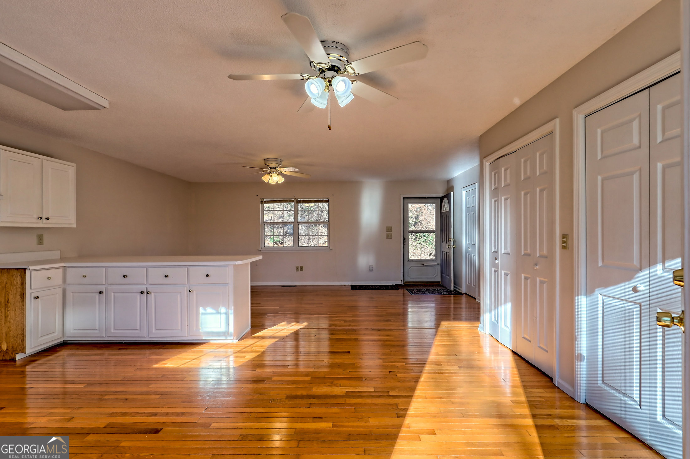 170 White Street Dillard, GA 30537 - Photo 15 of 58 a view of an empty room with window and cabinet