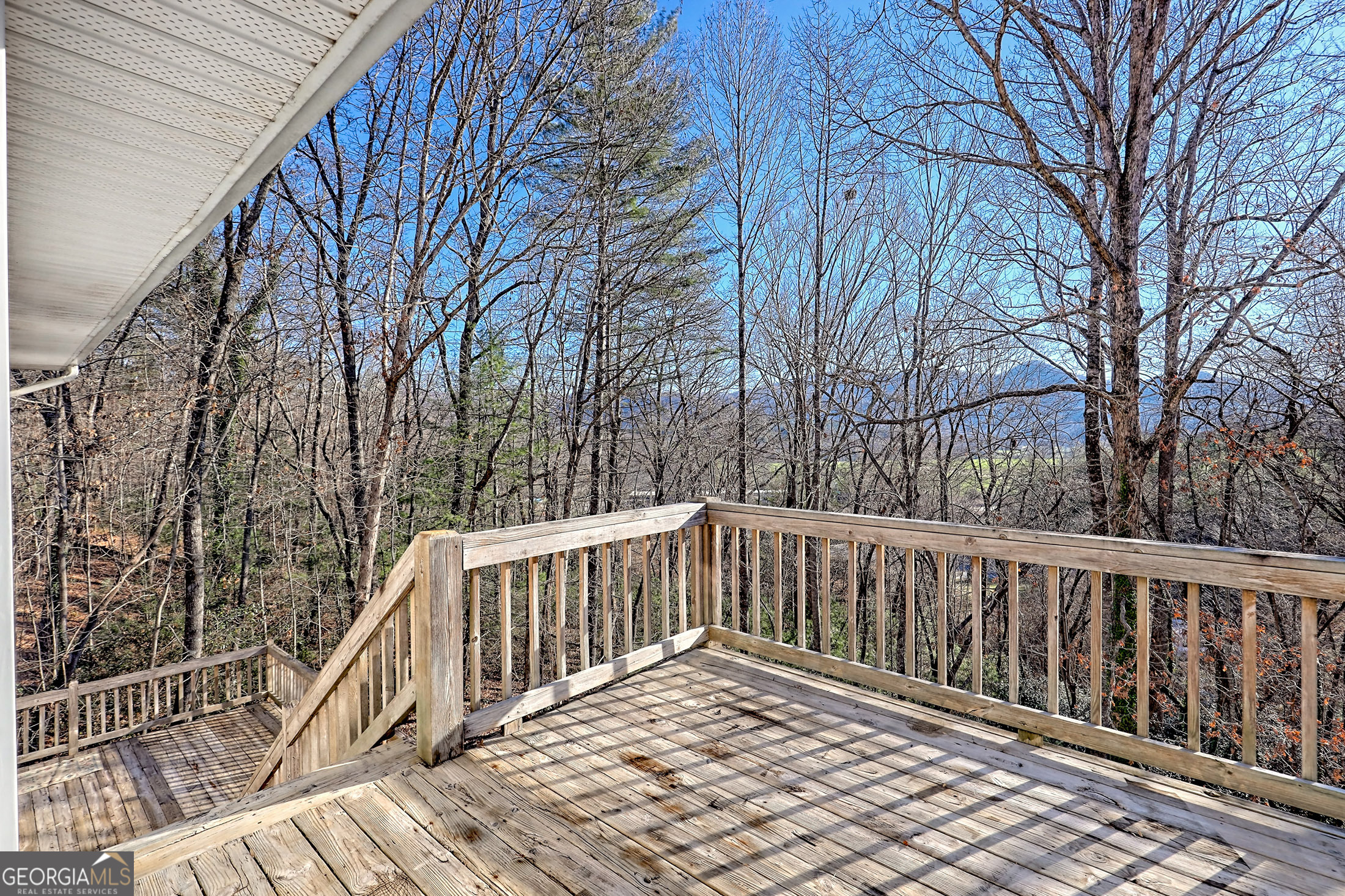 170 White Street Dillard, GA 30537 - Photo 17 of 58 a view of a wooden roof deck