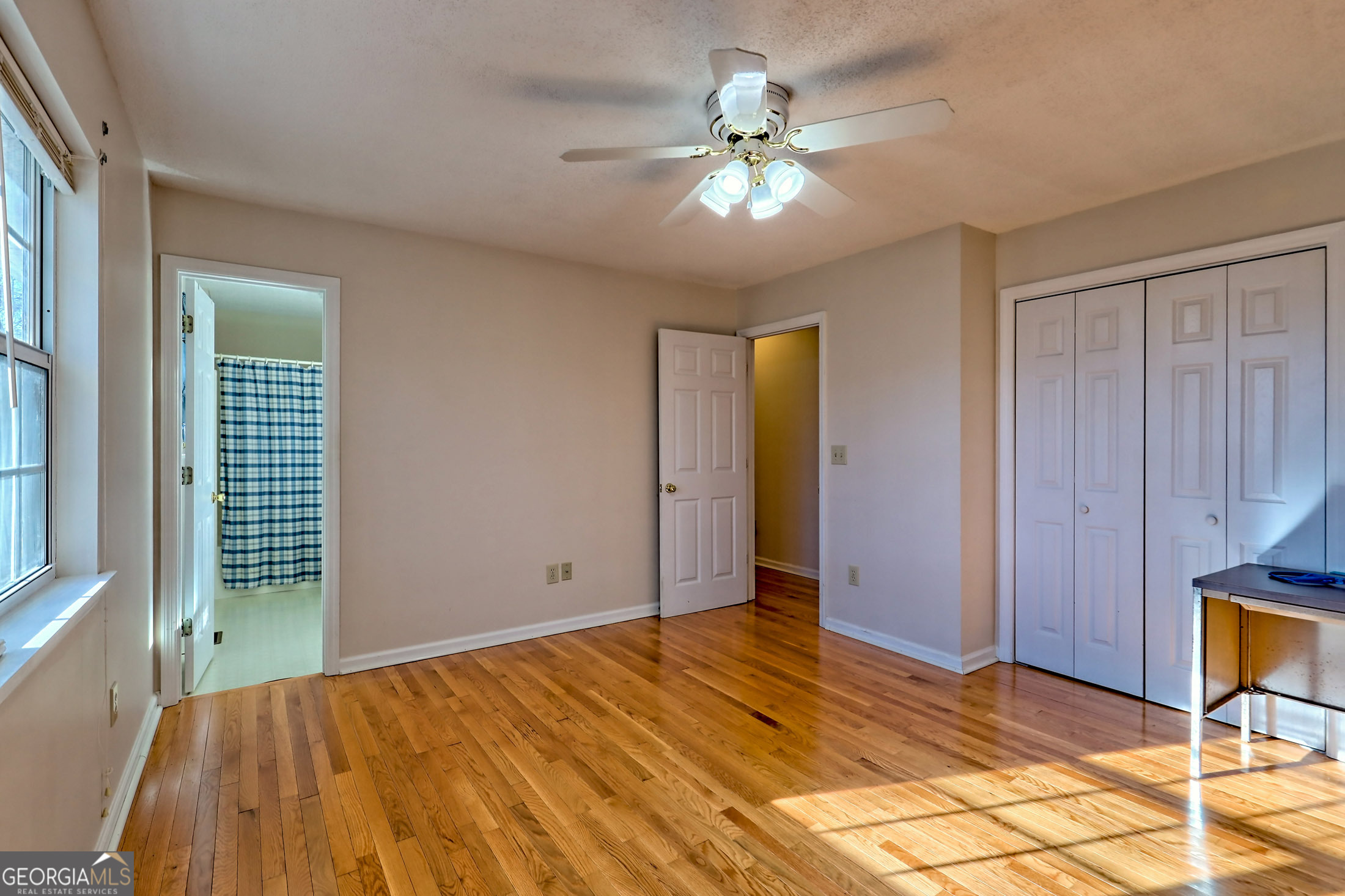 170 White Street Dillard, GA 30537 - Photo 23 of 58 a view of an empty room with window and chandelier fan