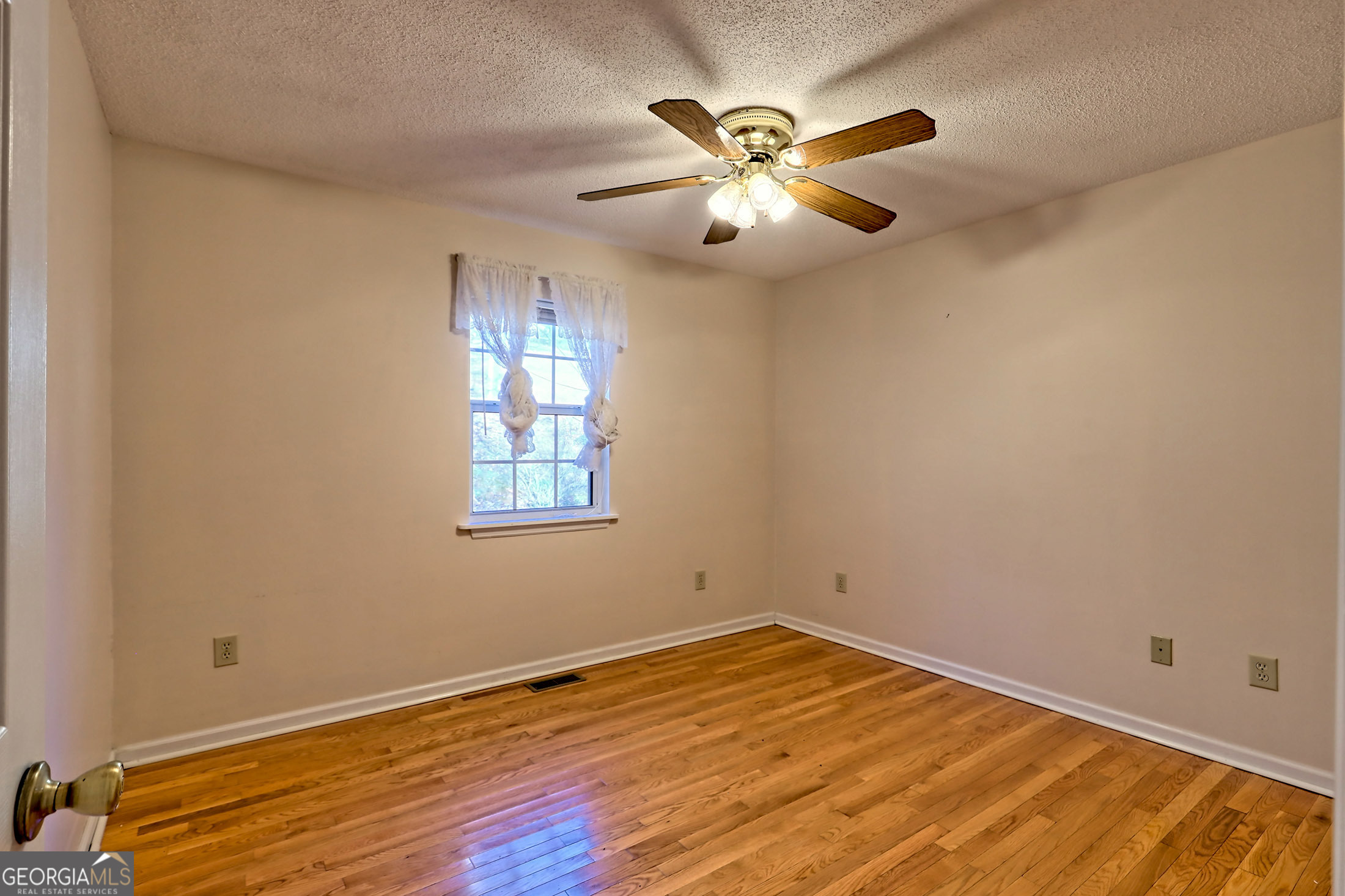 170 White Street Dillard, GA 30537 - Photo 27 of 58 a view of empty room with wooden floor