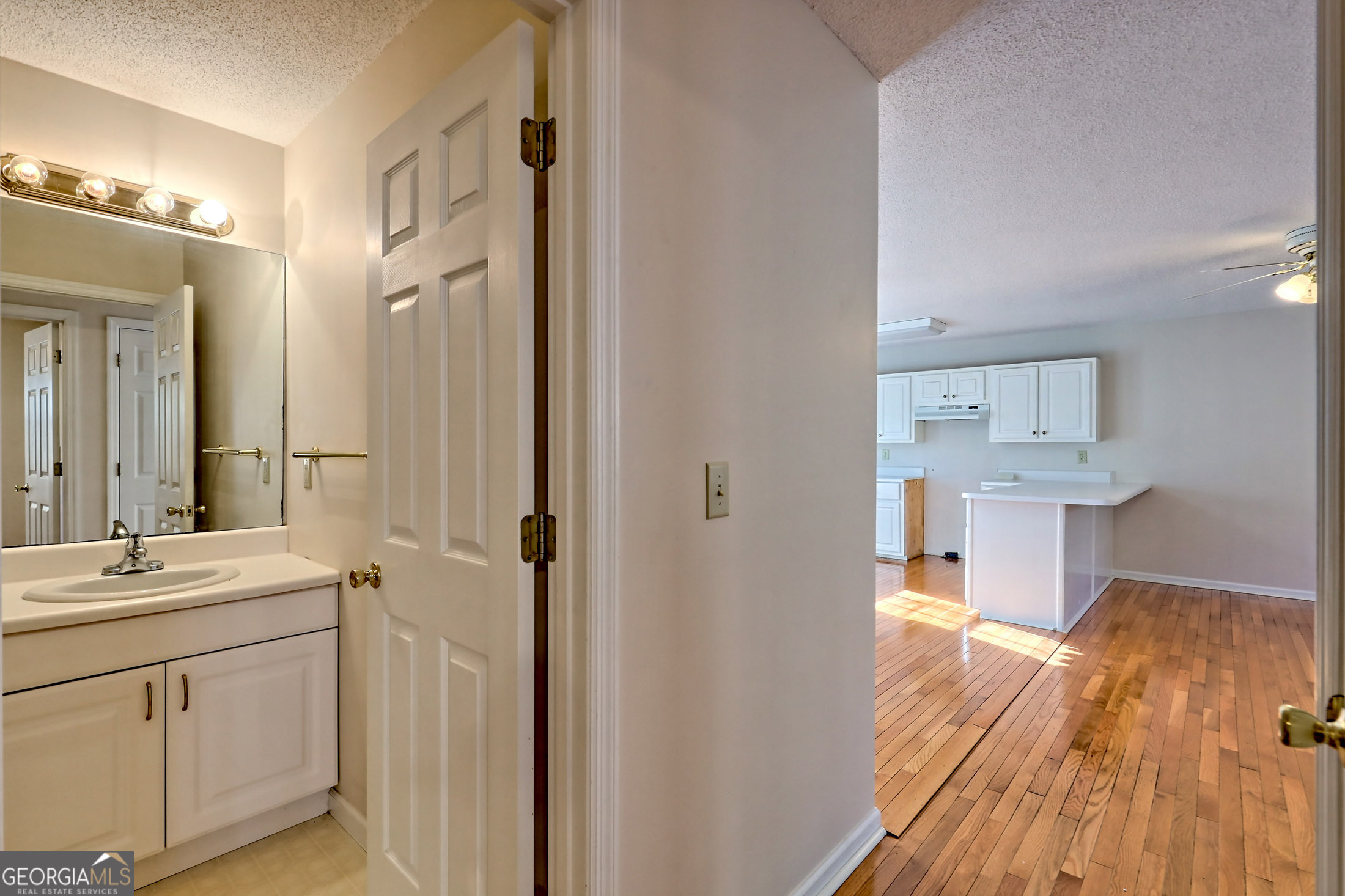 170 White Street Dillard, GA 30537 - Photo 31 of 58 a bathroom with a sink and a mirror
