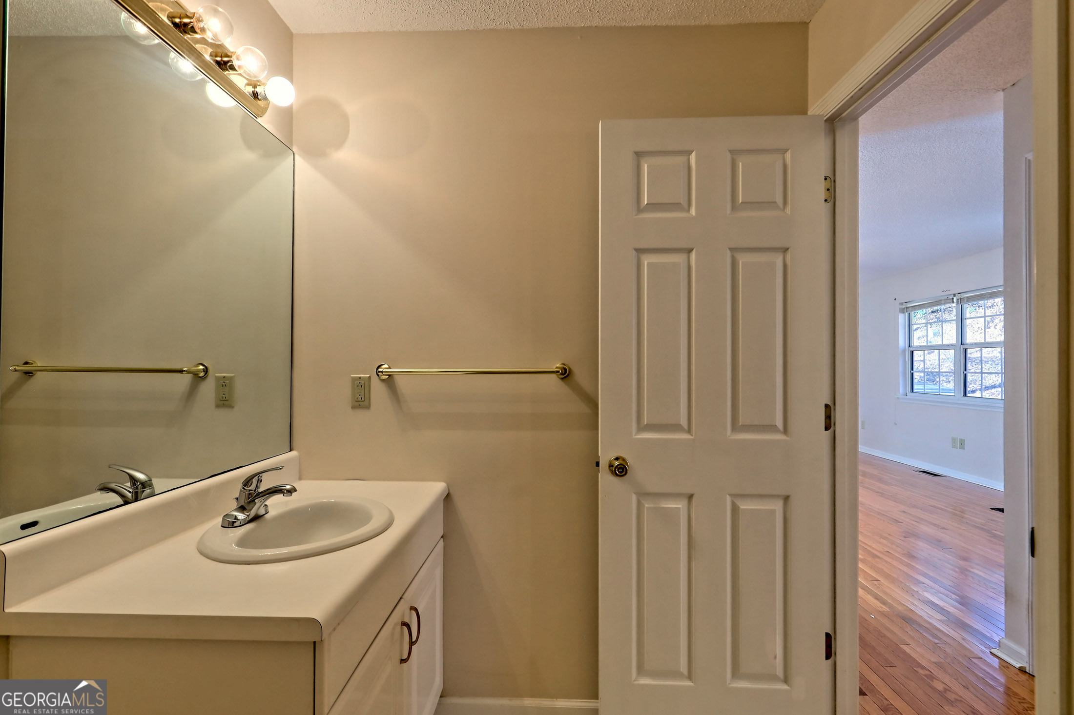 170 White Street Dillard, GA 30537 - Photo 33 of 58 a bathroom with a sink and a mirror