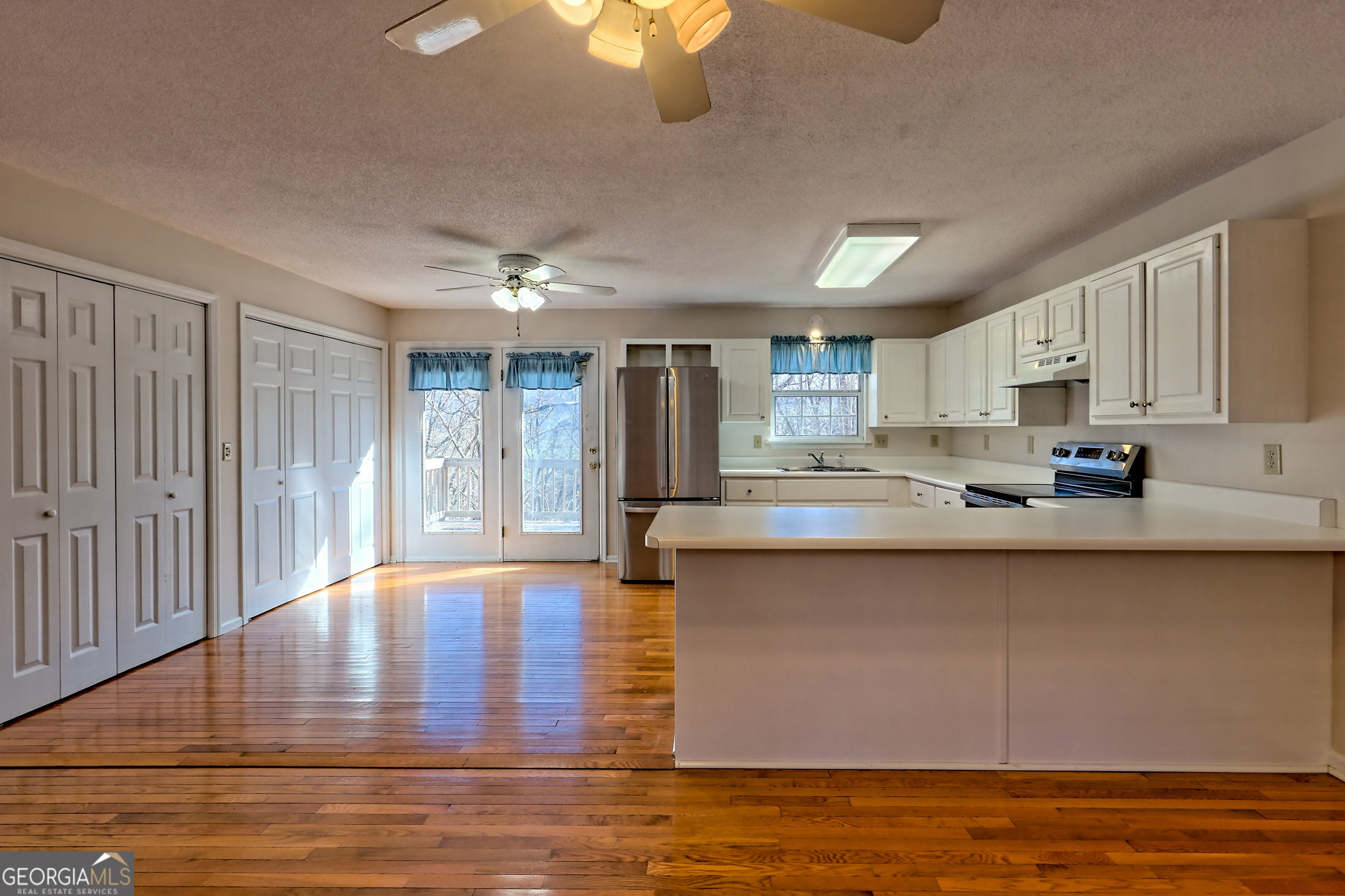 170 White Street Dillard, GA 30537 - Photo 4 of 58 a large kitchen with stainless steel appliances granite countertop a granite counter tops and a window