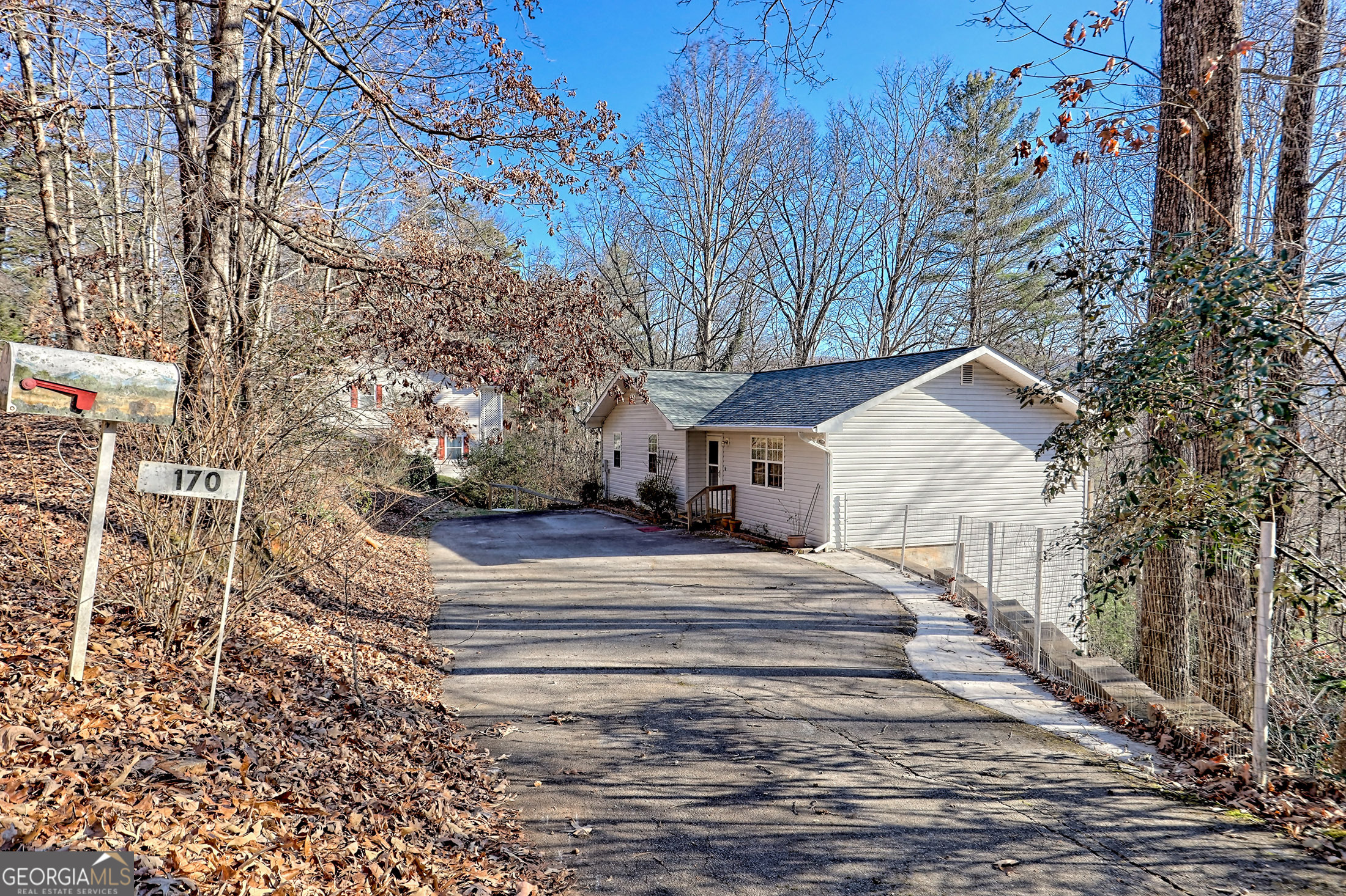 170 White Street Dillard, GA 30537 - Photo 47 of 58 a front view of a house with a yard covered in snow