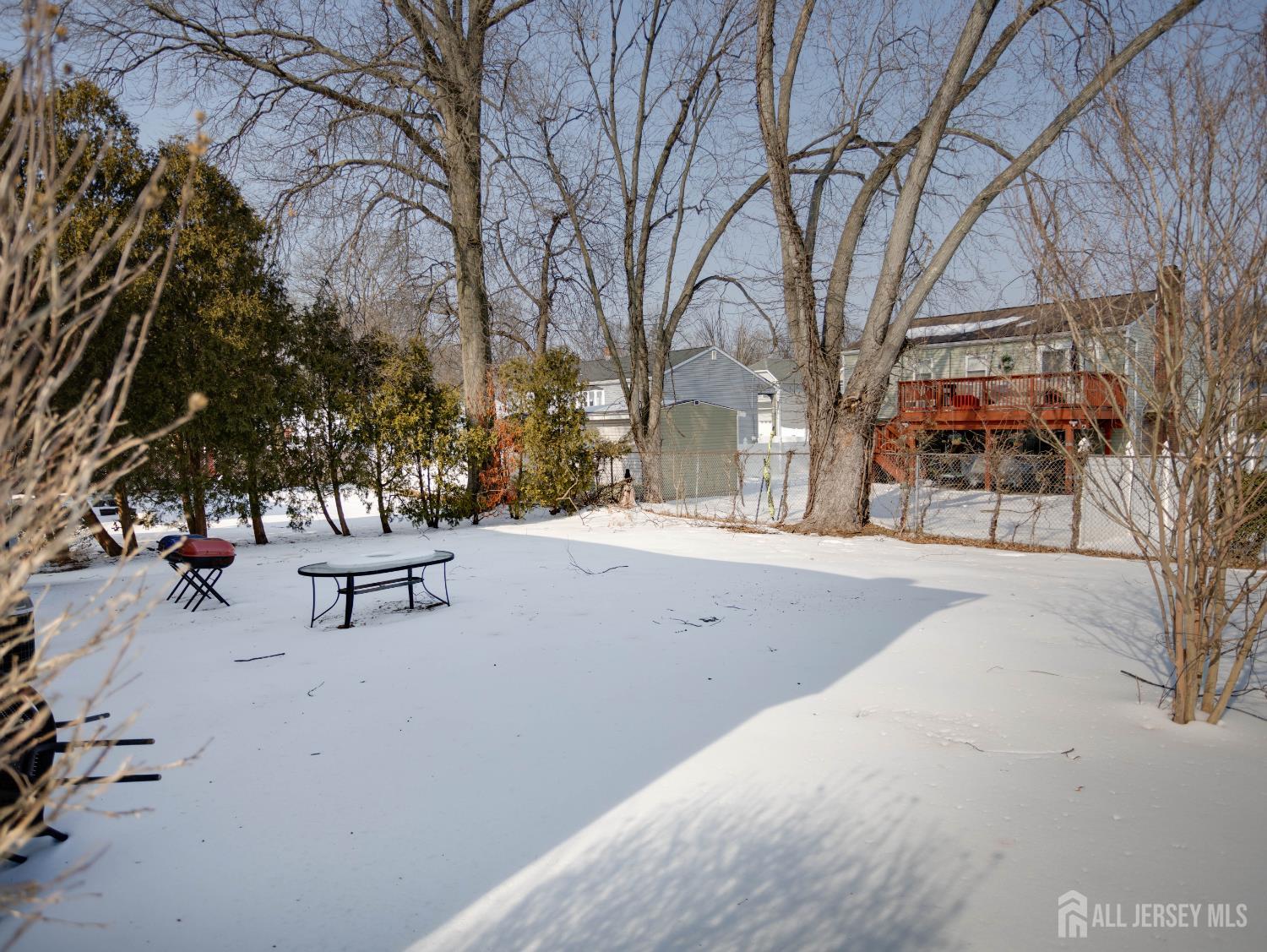 15 East Walnut Street Colonia, NJ 07067 - Photo 23 of 23 a park view with bench and trees