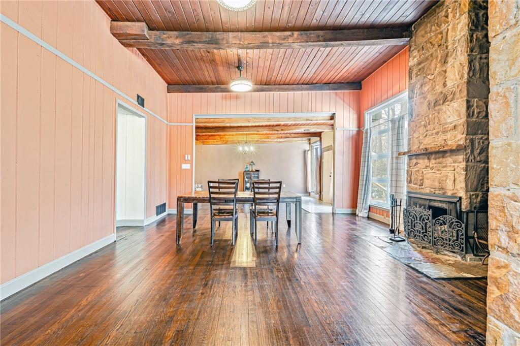 128 Sky Top Road Acme, PA 15610 - Photo 13 of 34 a dining room with furniture window and wooden floor