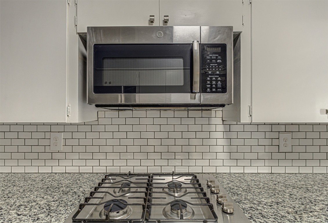 2001 Oakglen Drive Austin, TX 78745 - Photo 15 of 40 a bathroom with a sink a toilet and a mirror