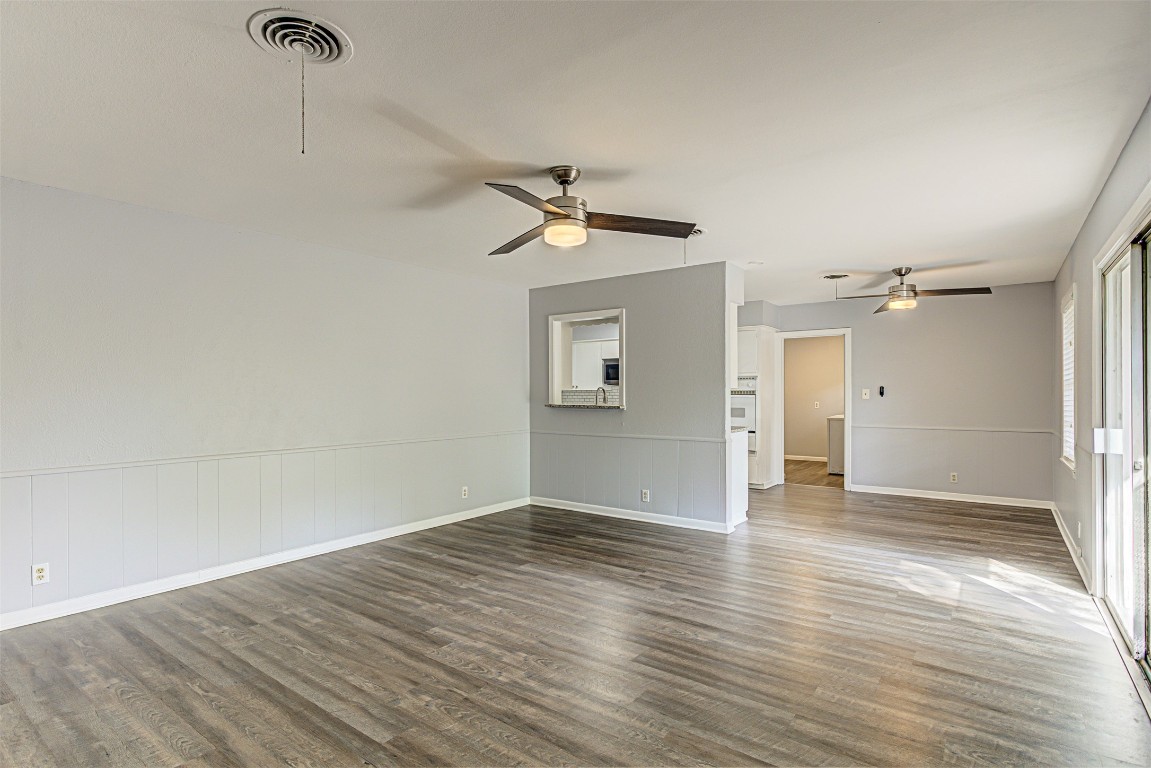 2001 Oakglen Drive Austin, TX 78745 - Photo 23 of 40 wooden floor in an empty room with a window