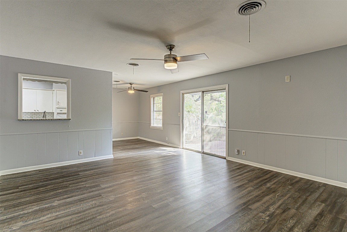 2001 Oakglen Drive Austin, TX 78745 - Photo 24 of 40 wooden floor in an empty room with a window