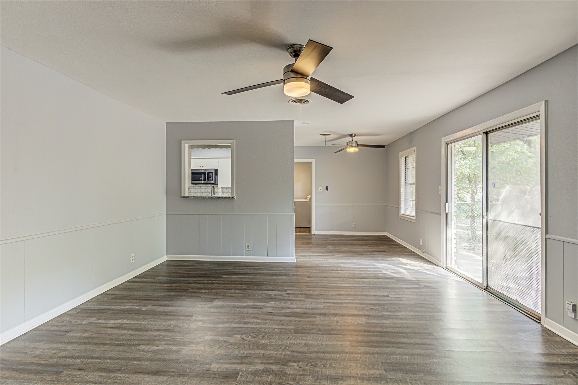 2001 Oakglen Drive Austin, TX 78745 - Photo 25 of 40 a view of empty room with wooden floor and fan