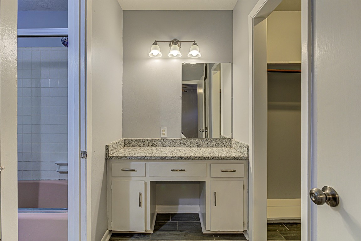 2001 Oakglen Drive Austin, TX 78745 - Photo 29 of 40 a bathroom with a sink and a mirror