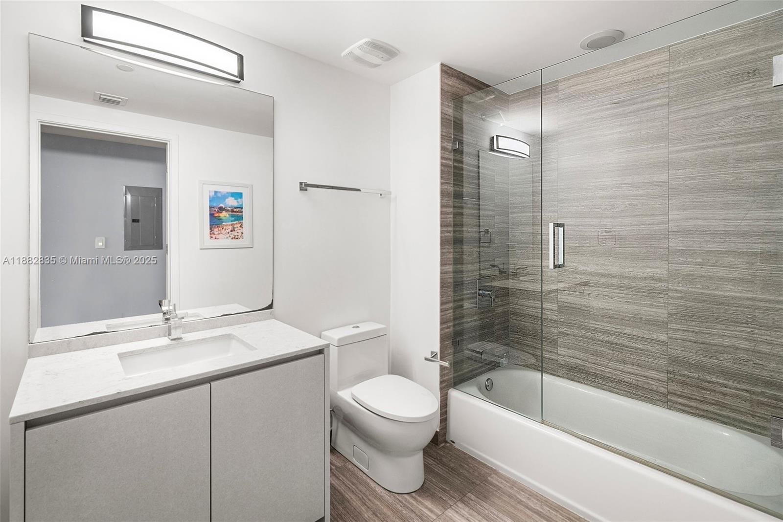 1010 Brickell Avenue, Unit 3610 Miami, FL 33131 - Photo 19 of 37 a bathroom with a sink a toilet and shower