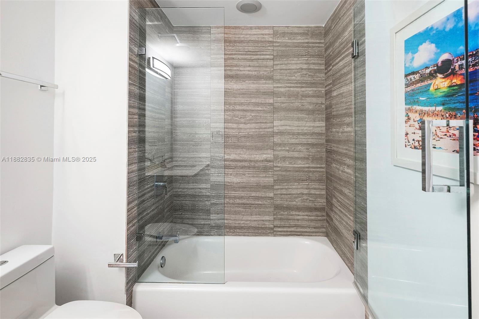 1010 Brickell Avenue, Unit 3610 Miami, FL 33131 - Photo 20 of 37 a bathroom with a bathtub
