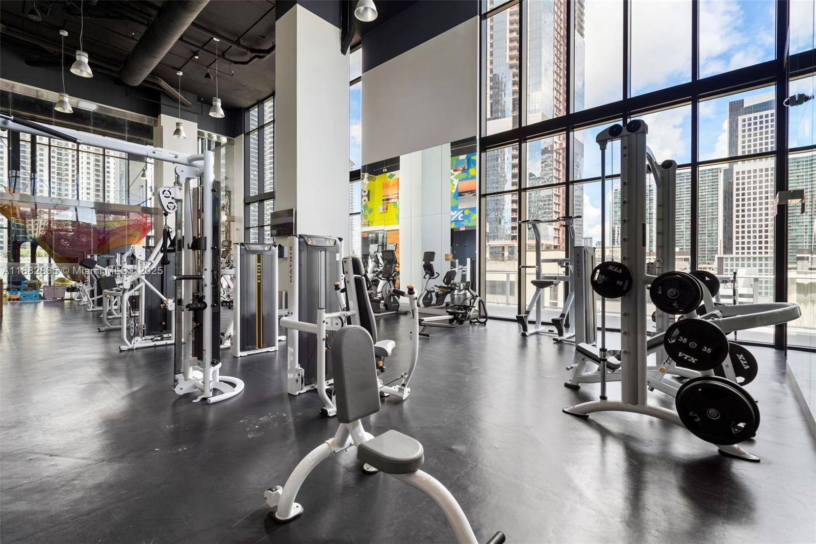 1010 Brickell Avenue, Unit 3610 Miami, FL 33131 - Photo 32 of 37 a view of a room with gym equipment