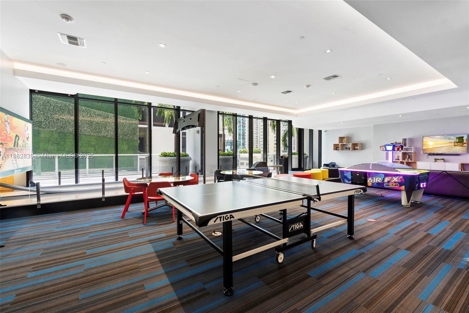 1010 Brickell Avenue, Unit 3610 Miami, FL 33131 - Photo 37 of 37 a living room with furniture a table and a large window