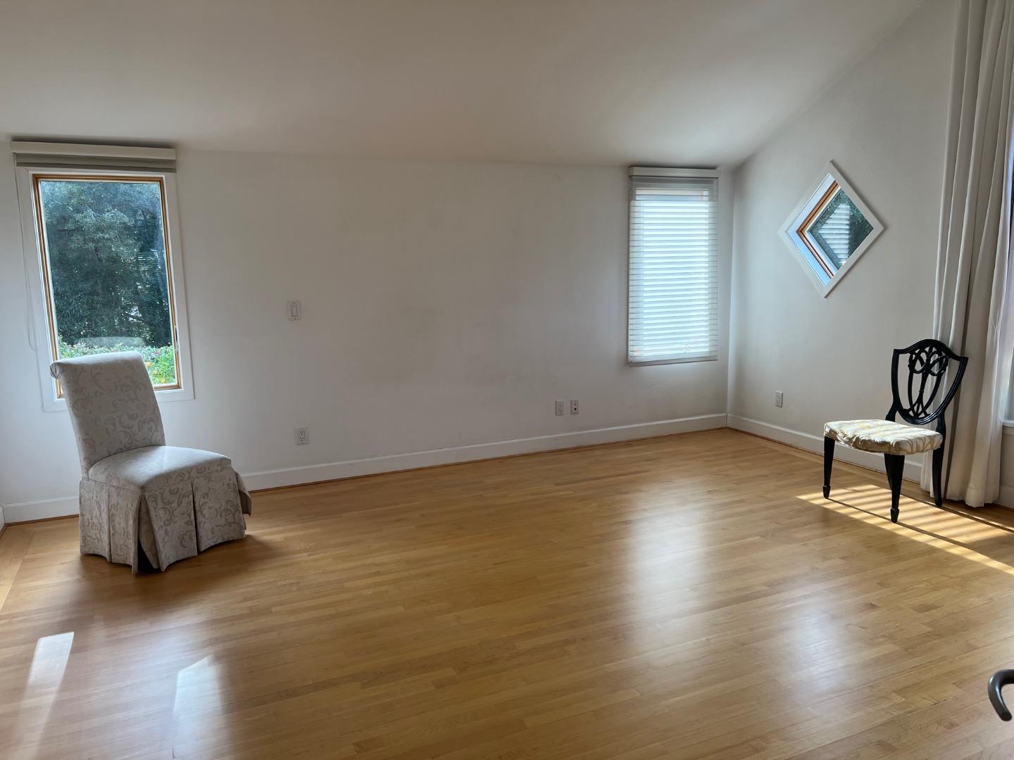 2198 Avy Avenue Menlo Park, CA 94025 - Photo 12 of 28 a living room with furniture and a window