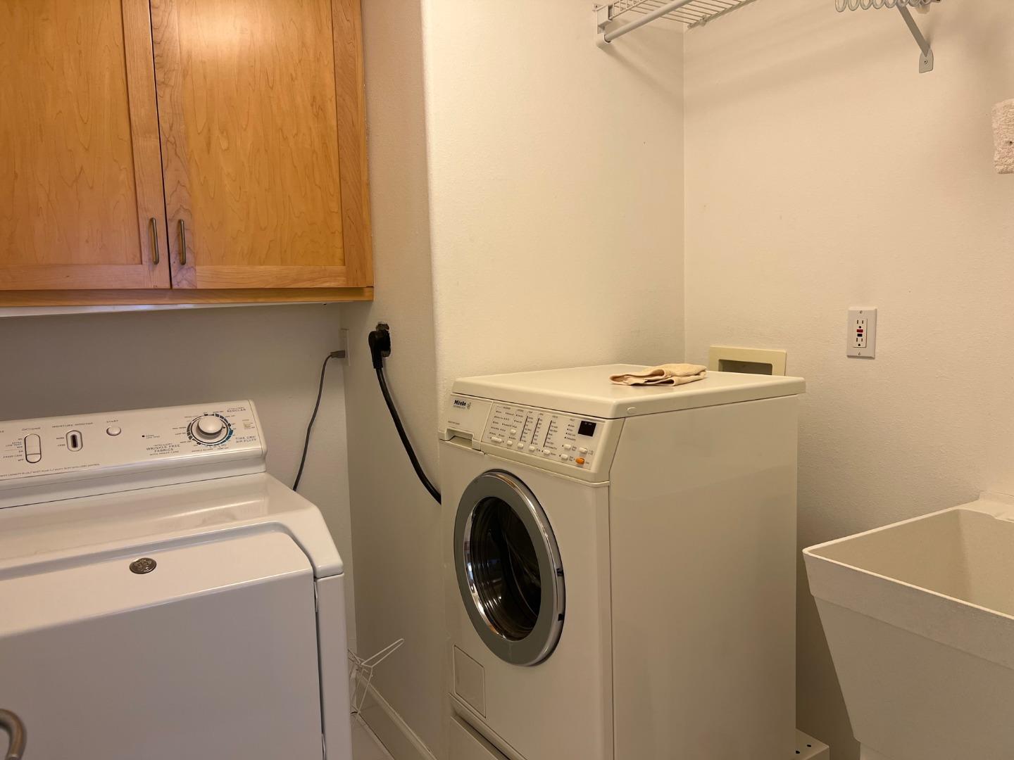 2198 Avy Avenue Menlo Park, CA 94025 - Photo 20 of 28 a utility room with dryer and washer