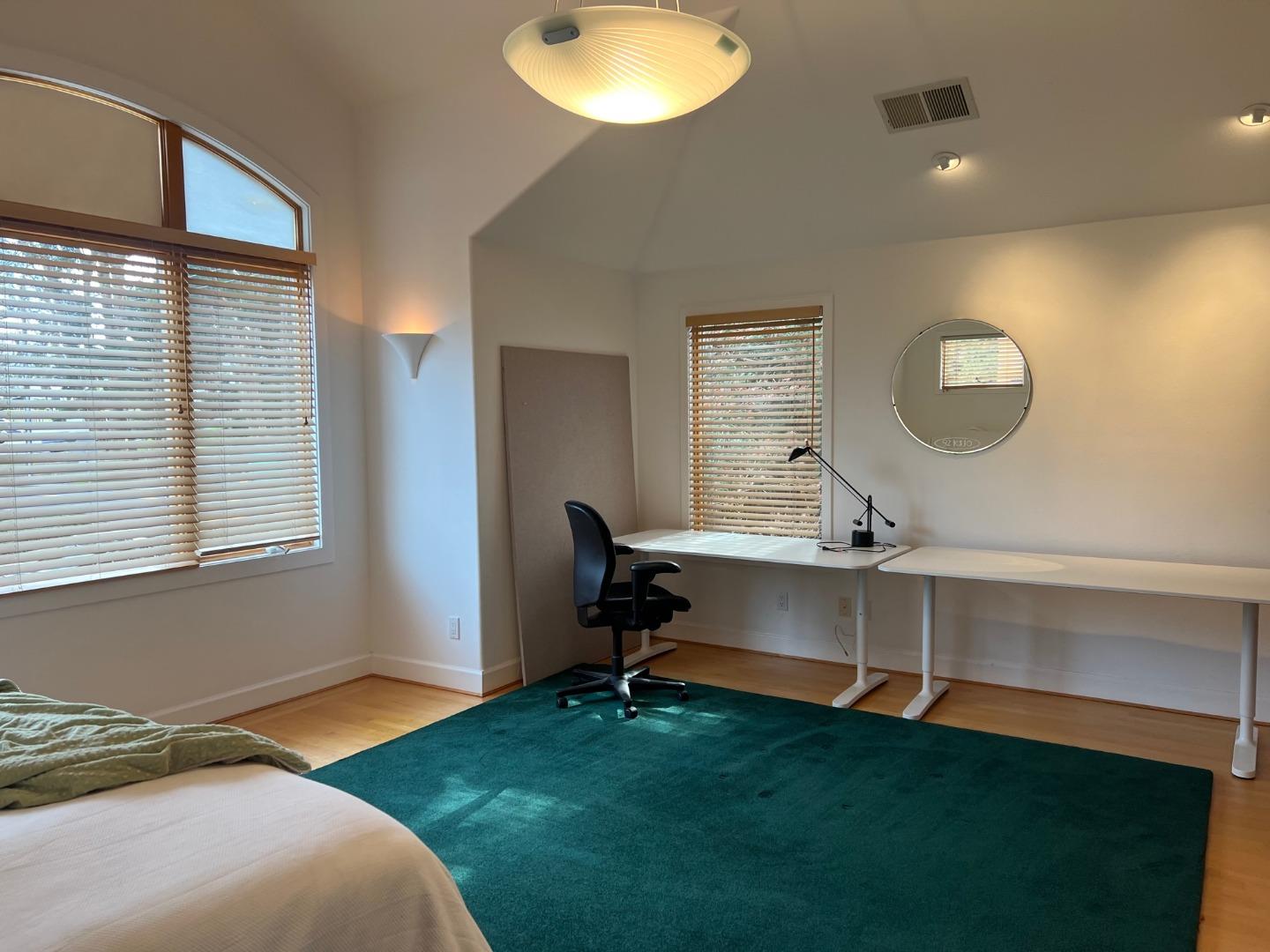 2198 Avy Avenue Menlo Park, CA 94025 - Photo 22 of 28 a living room with a bed furniture and a window