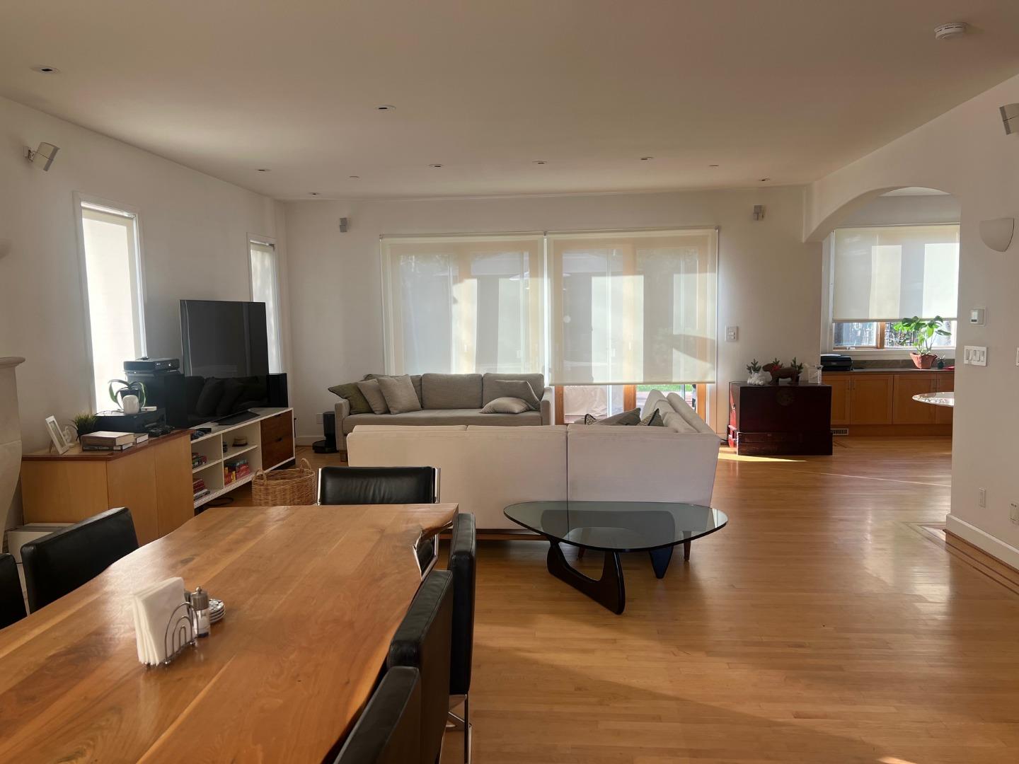2198 Avy Avenue Menlo Park, CA 94025 - Photo 3 of 28 a living room with furniture and a flat screen tv