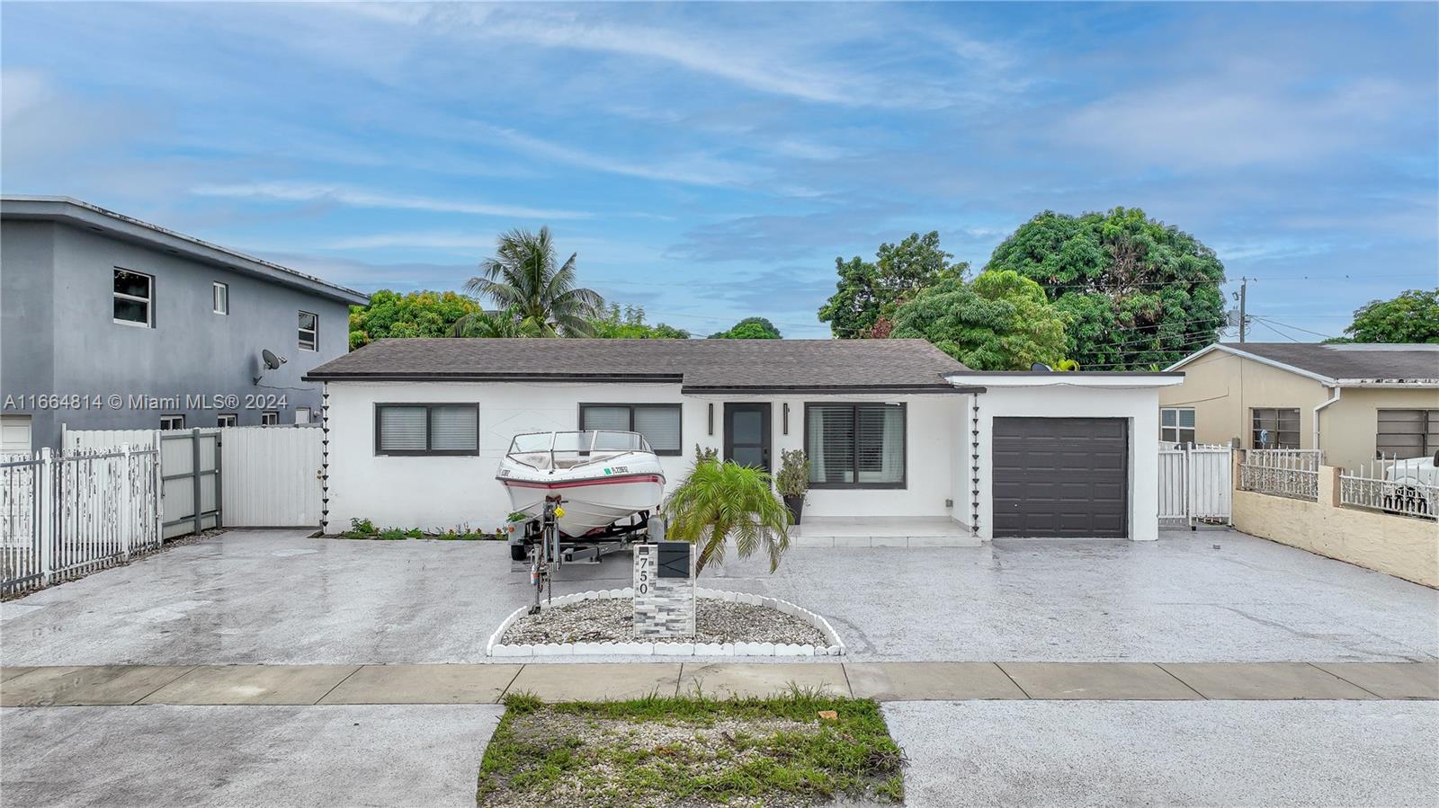 750 East 55th Street Hialeah, FL 33013 - Photo 1 of 66 a view of a house with a patio