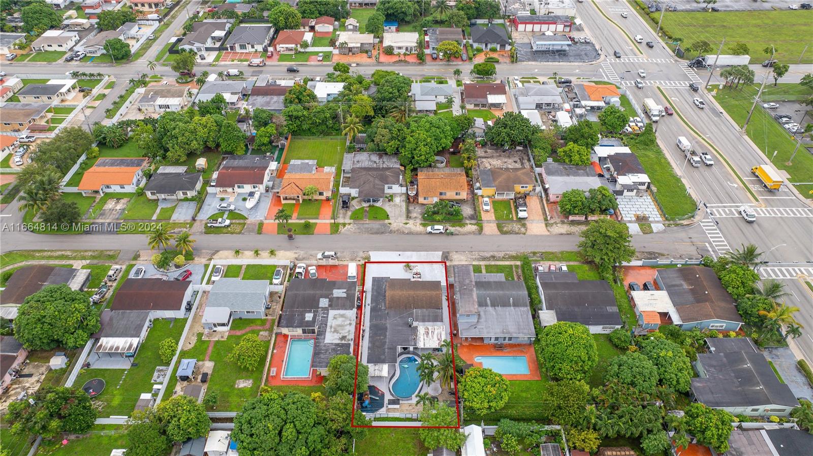 750 East 55th Street Hialeah, FL 33013 - Photo 44 of 66 an aerial view of residential houses with outdoor space