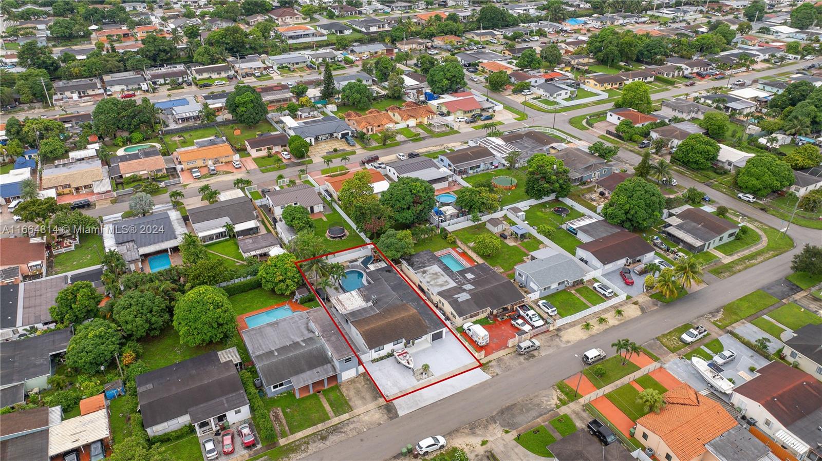 750 East 55th Street Hialeah, FL 33013 - Photo 47 of 66 an aerial view of residential houses with outdoor space