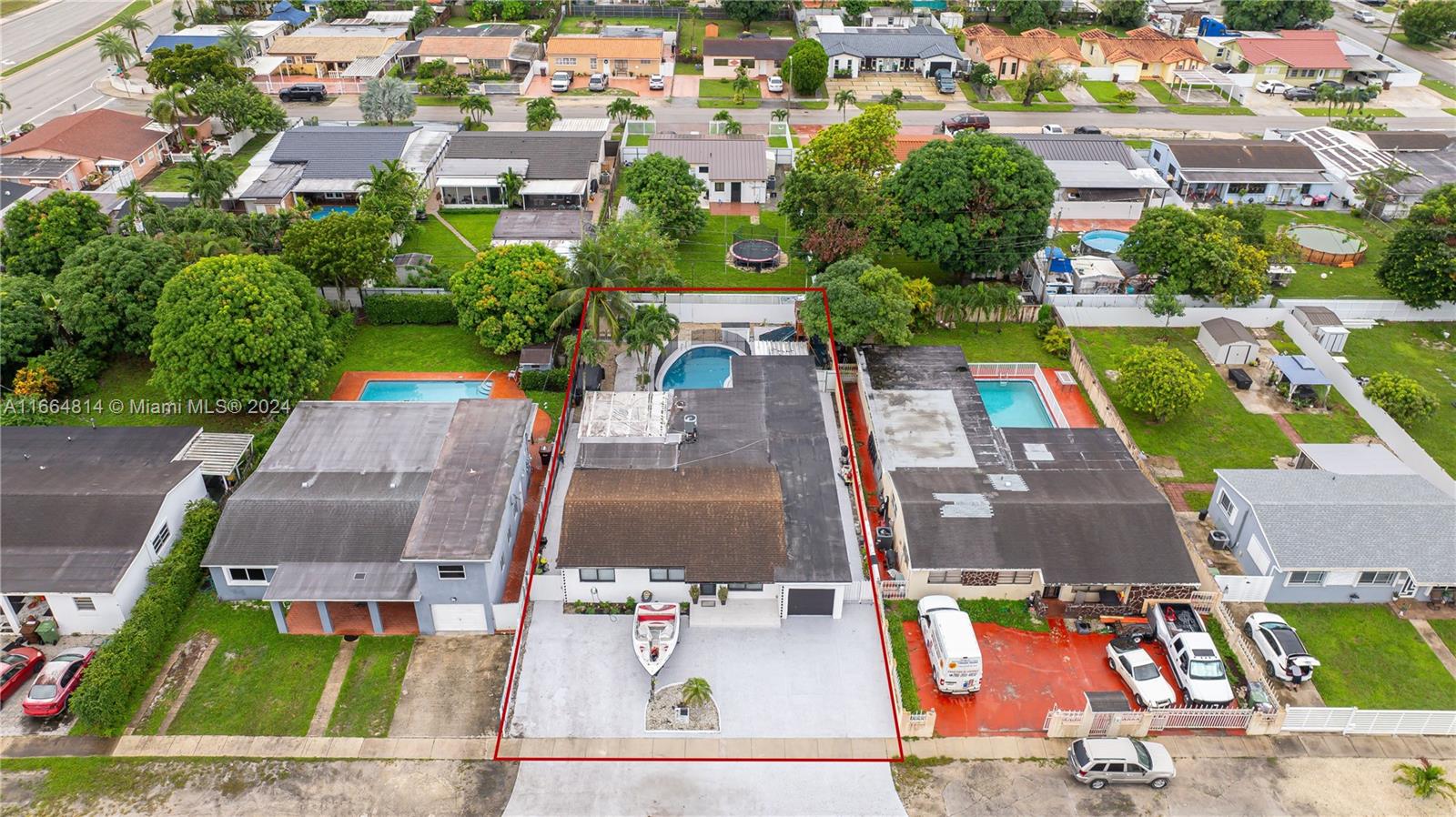 750 East 55th Street Hialeah, FL 33013 - Photo 49 of 66 an aerial view of residential houses with outdoor space
