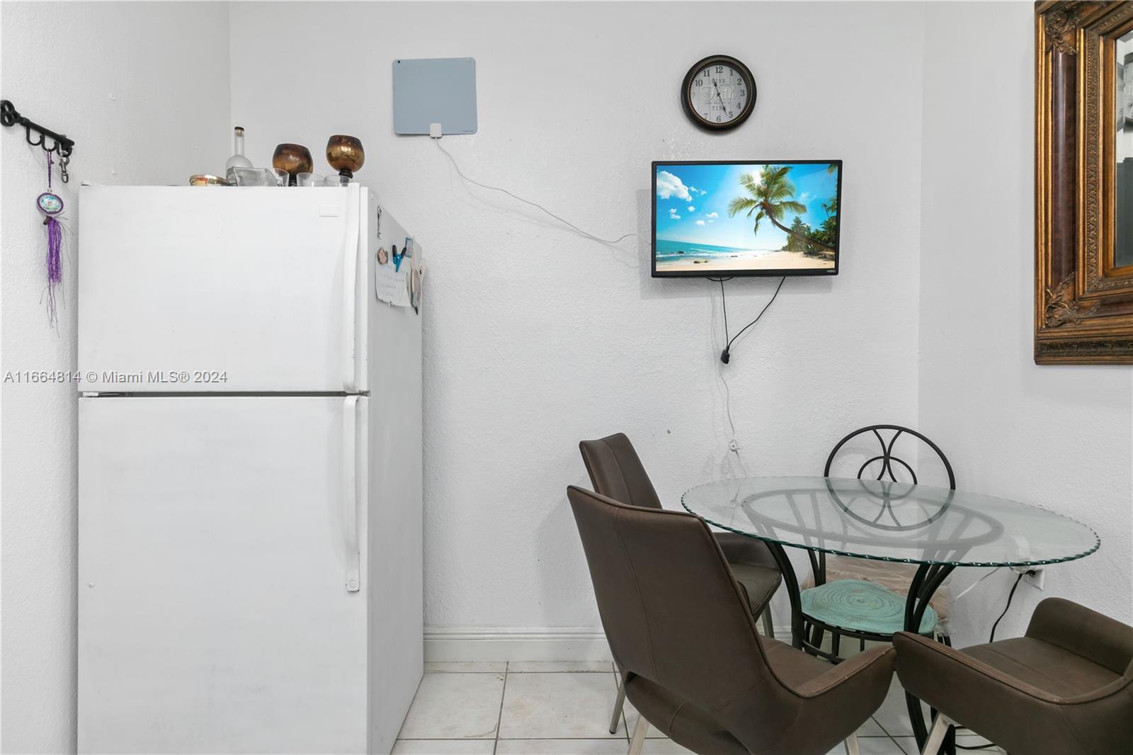 750 East 55th Street Hialeah, FL 33013 - Photo 53 of 66 a view of a dining room with furniture and wooden floor