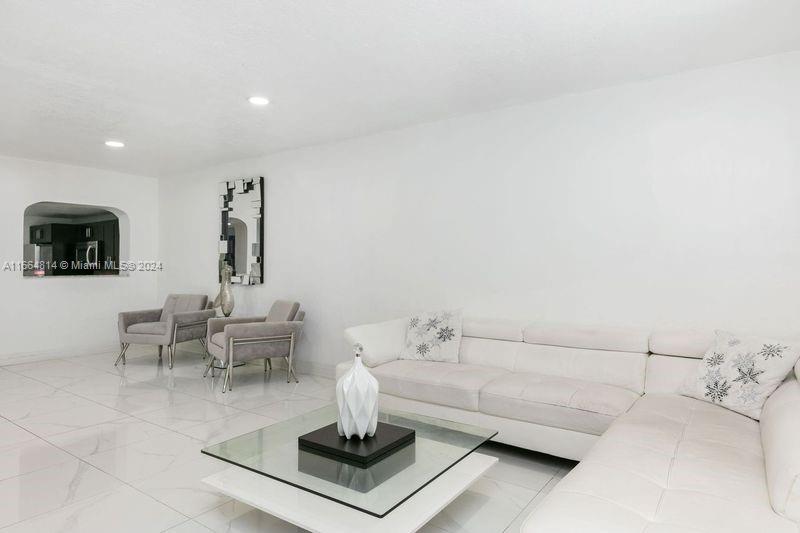 750 East 55th Street Hialeah, FL 33013 - Photo 7 of 66 a living room with furniture