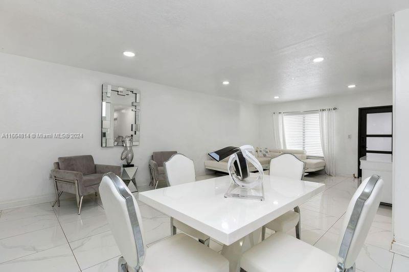 750 East 55th Street Hialeah, FL 33013 - Photo 9 of 66 a view of a dining room with furniture