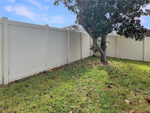 a view of a house with backyard