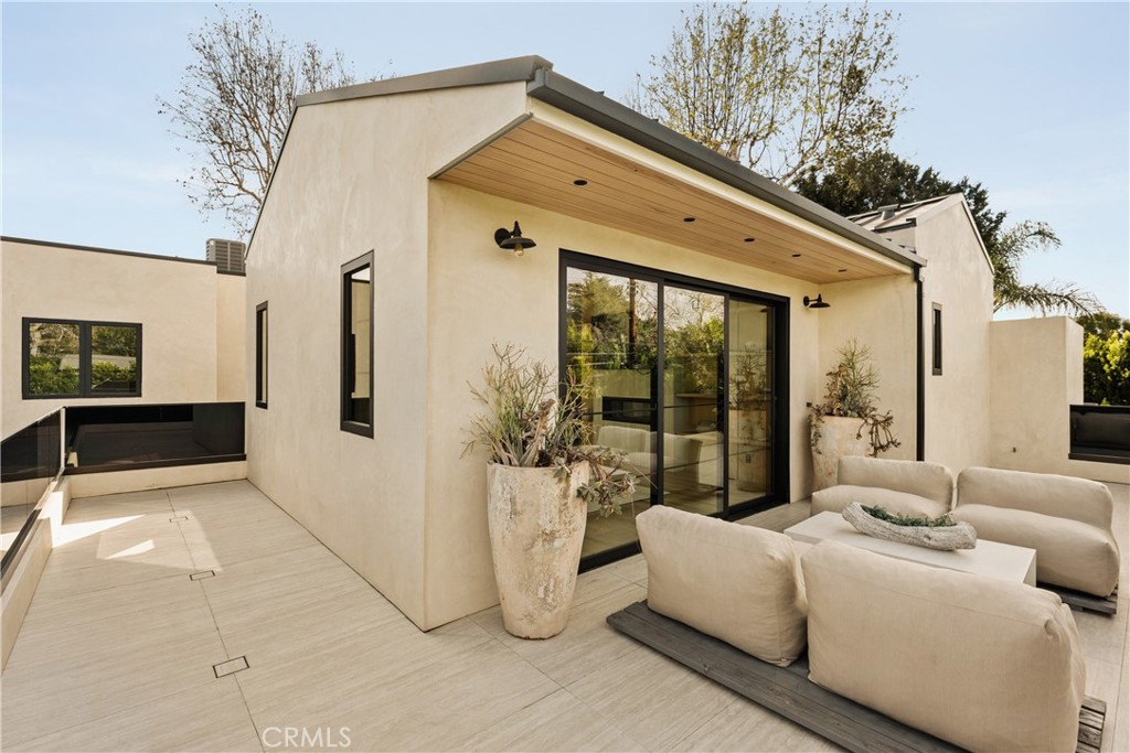 11937 Addison Street Valley Village, CA 91607 - Photo 22 of 48 a front view of a house with glass doors