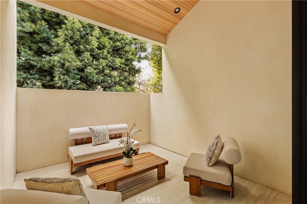 11937 Addison Street Valley Village, CA 91607 - Photo 24 of 48 a living room with furniture and a potted plant