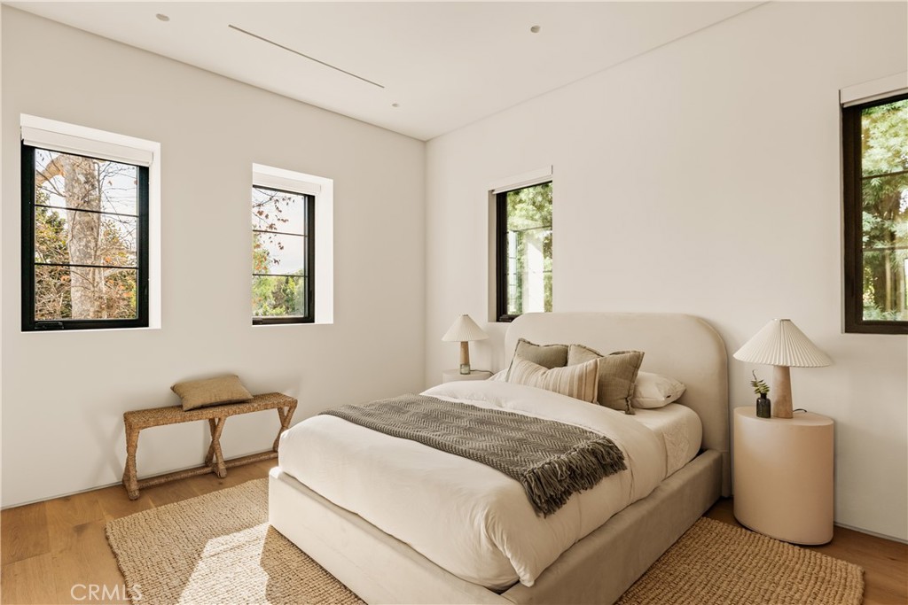 11937 Addison Street Valley Village, CA 91607 - Photo 27 of 48 a bedroom with bed and a window