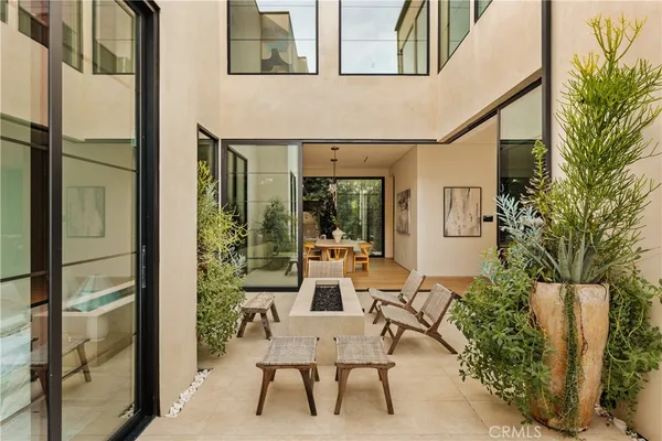 swimming pool view with a seating space