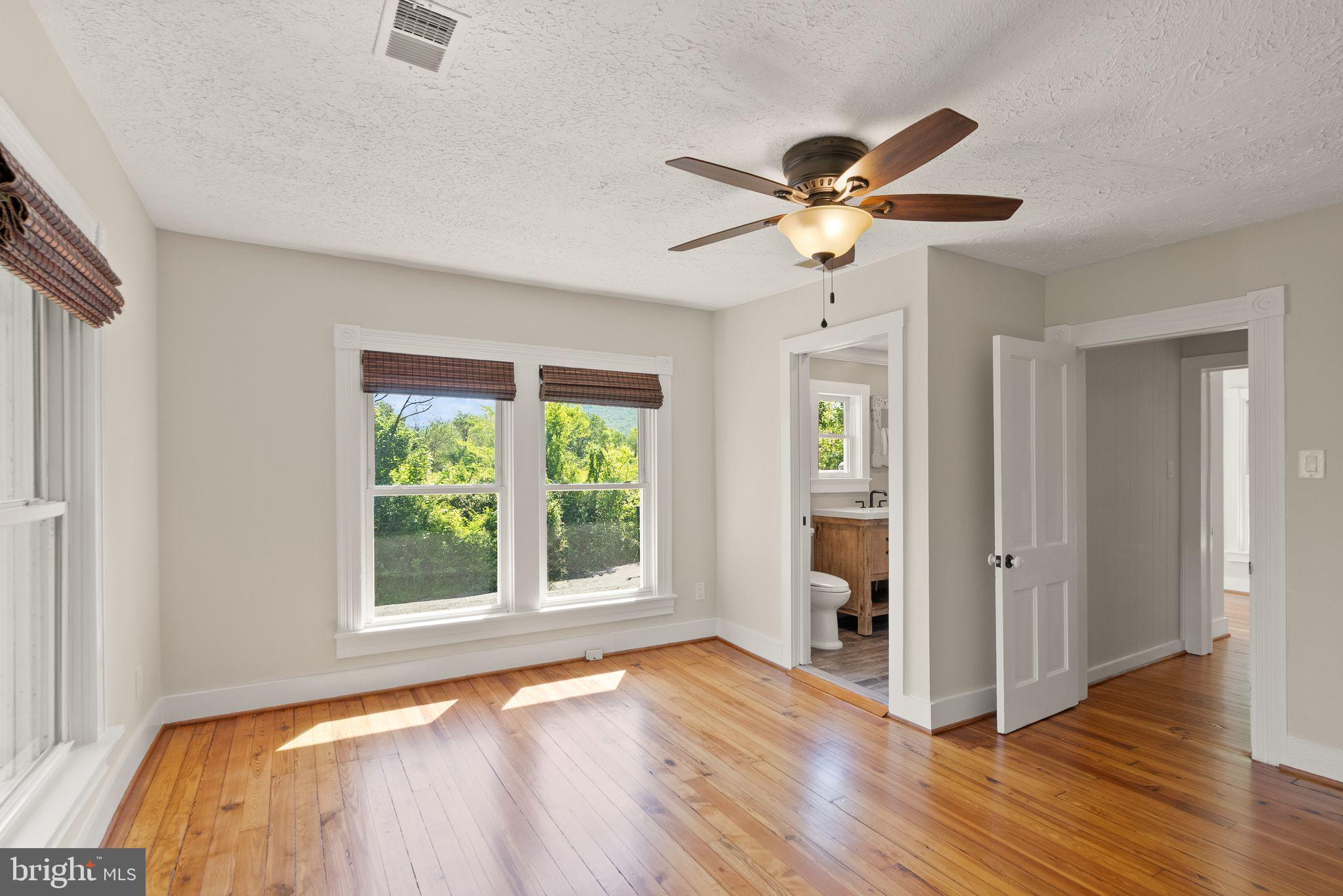 37151 Branchriver Road Purcellville, VA 20132 - Photo 33 of 63 a bedroom with a bed and a window