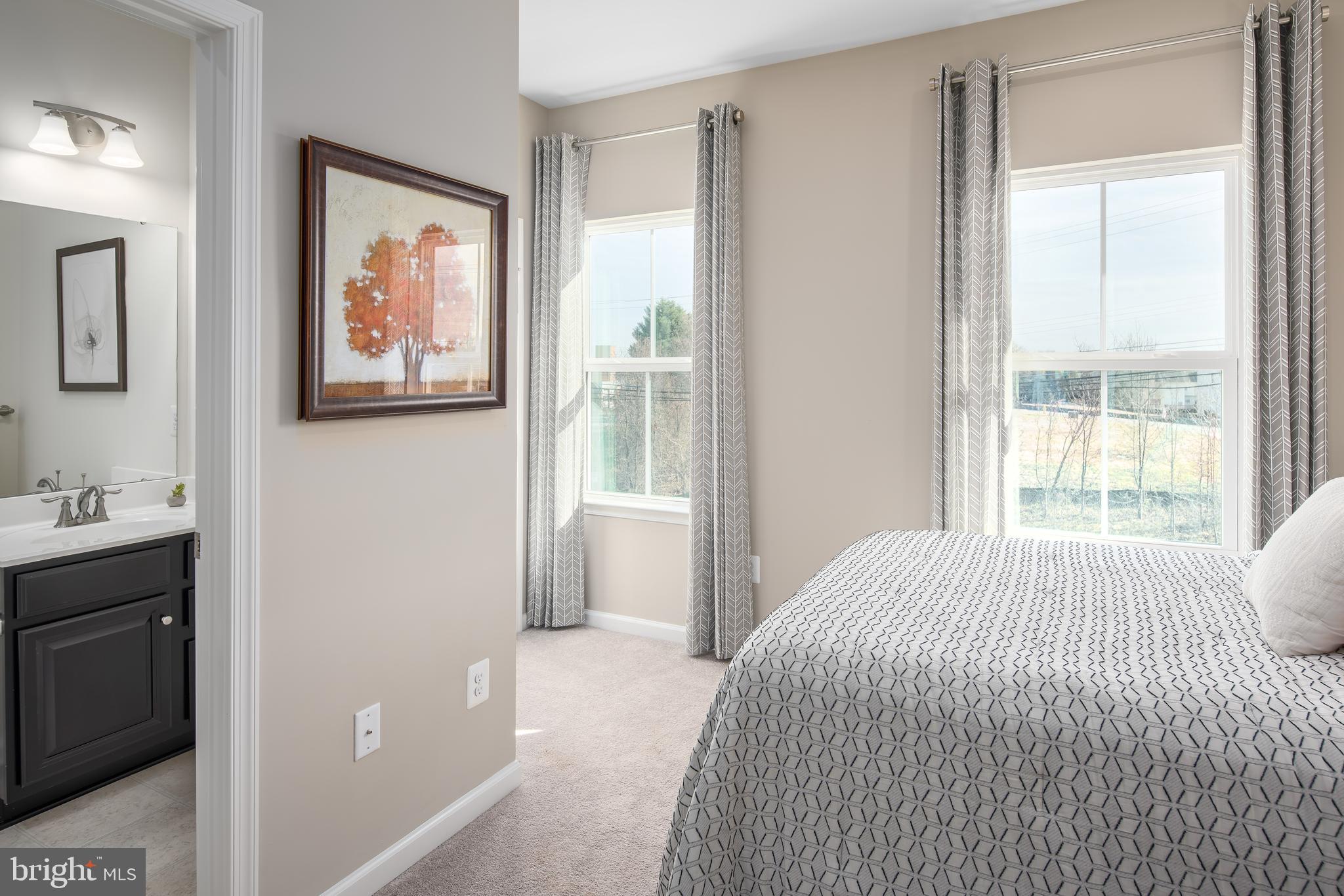 3200 Laurel Hill Road Hanover, MD 21076 - Photo 16 of 24 a bedroom with a bed and a window