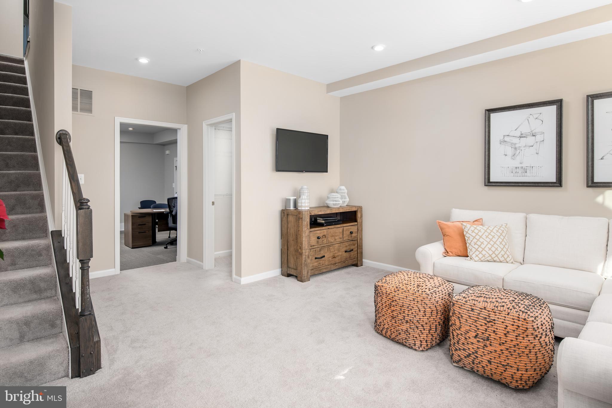 3200 Laurel Hill Road Hanover, MD 21076 - Photo 4 of 24 a living room with furniture and a flat screen tv
