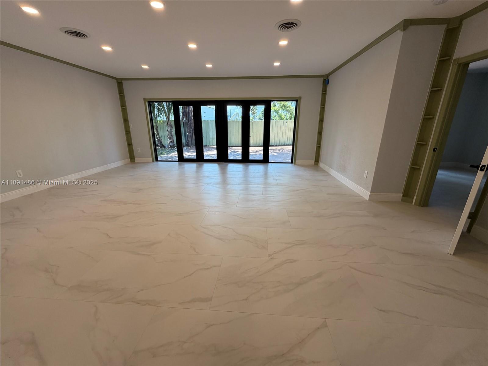 2120 Southwest 84th Avenue Miami, FL 33155 - Photo 19 of 26 a view of an empty room with a window