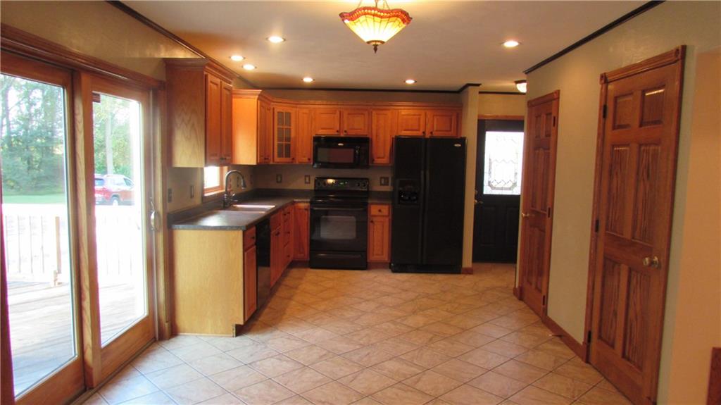 Eat in Kitchen with ceramic flooring... view from Living Room