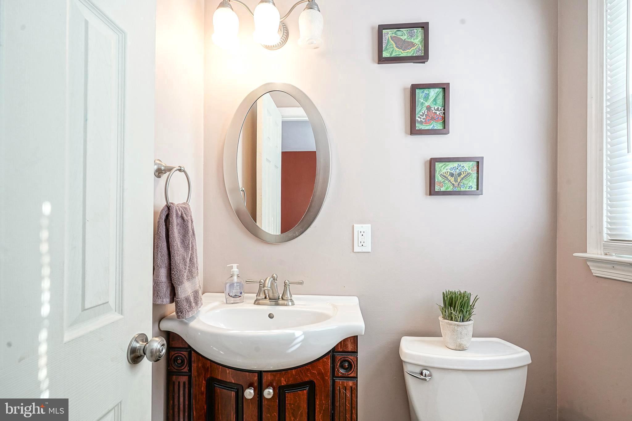 30 Tool Lane Williamstown, NJ 08094 - Photo 15 of 38 a bathroom with a toilet a sink and a mirror