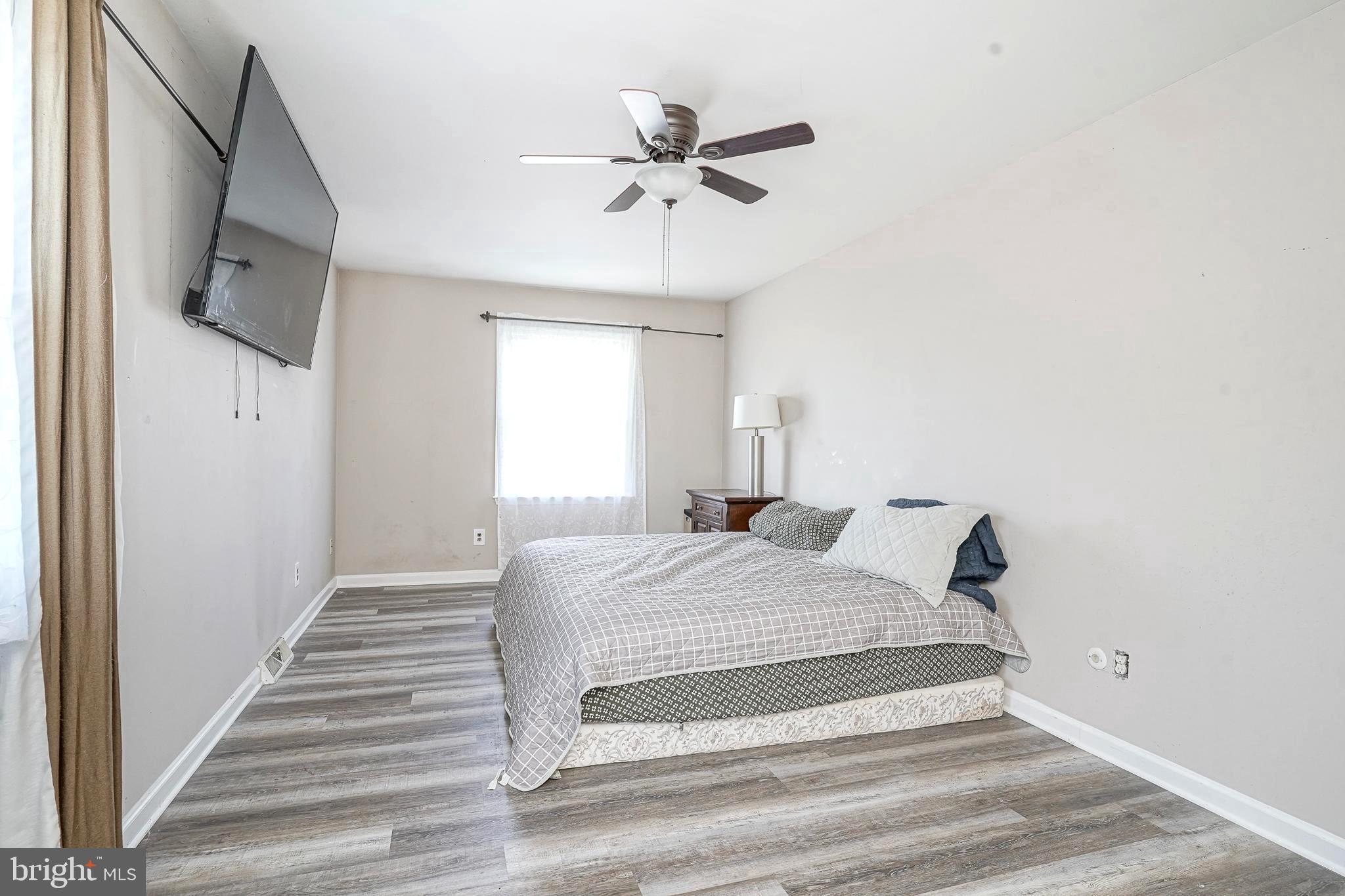 30 Tool Lane Williamstown, NJ 08094 - Photo 19 of 38 a bedroom with a bed and a flat screen tv