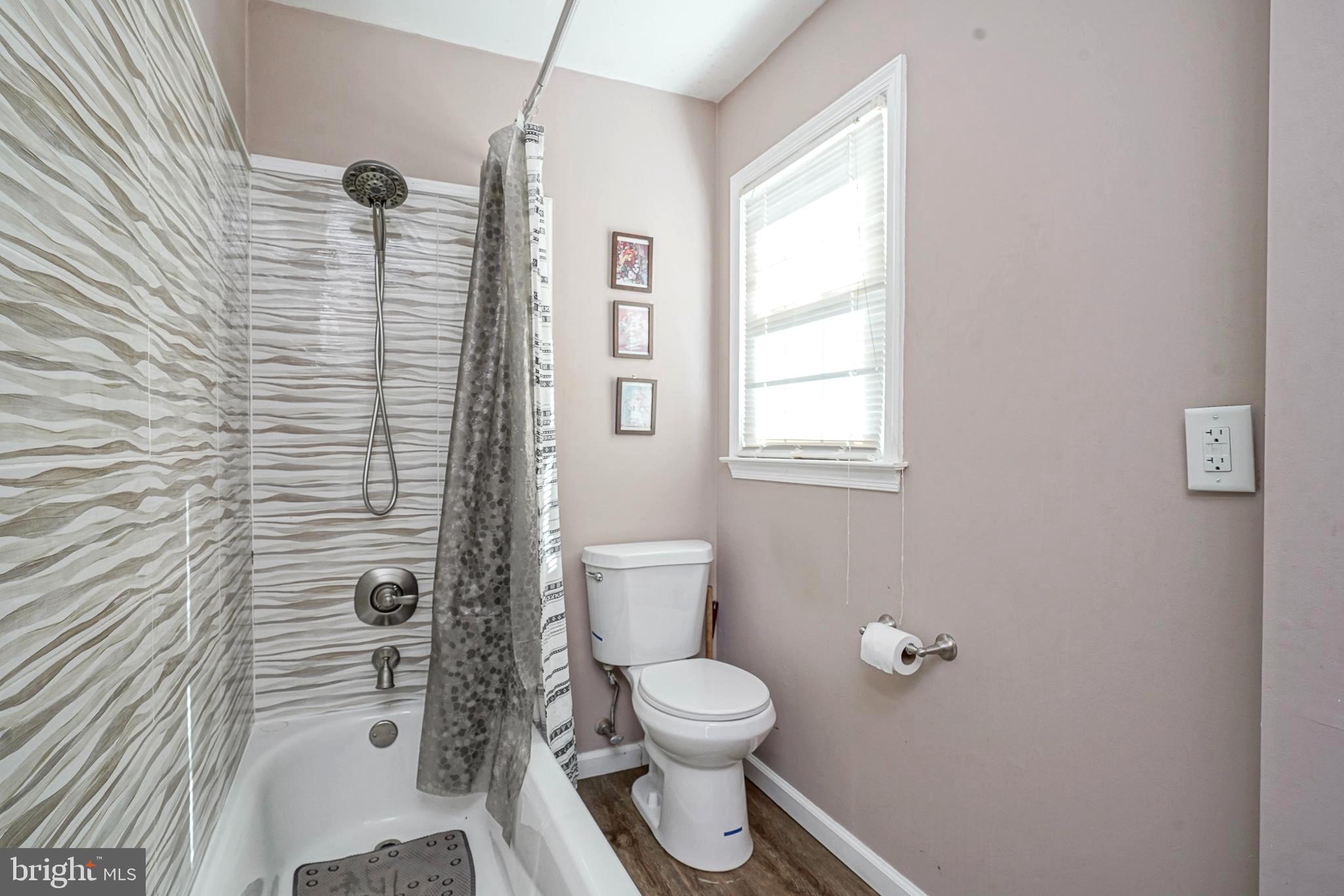 30 Tool Lane Williamstown, NJ 08094 - Photo 22 of 38 a bathroom with a toilet a sink and shower