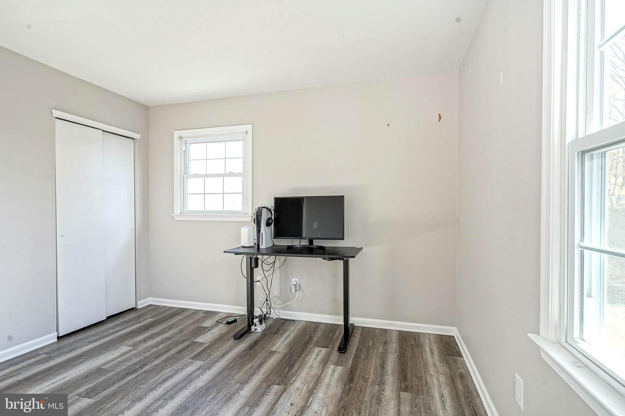 30 Tool Lane Williamstown, NJ 08094 - Photo 24 of 38 a room with a window and a flat screen tv