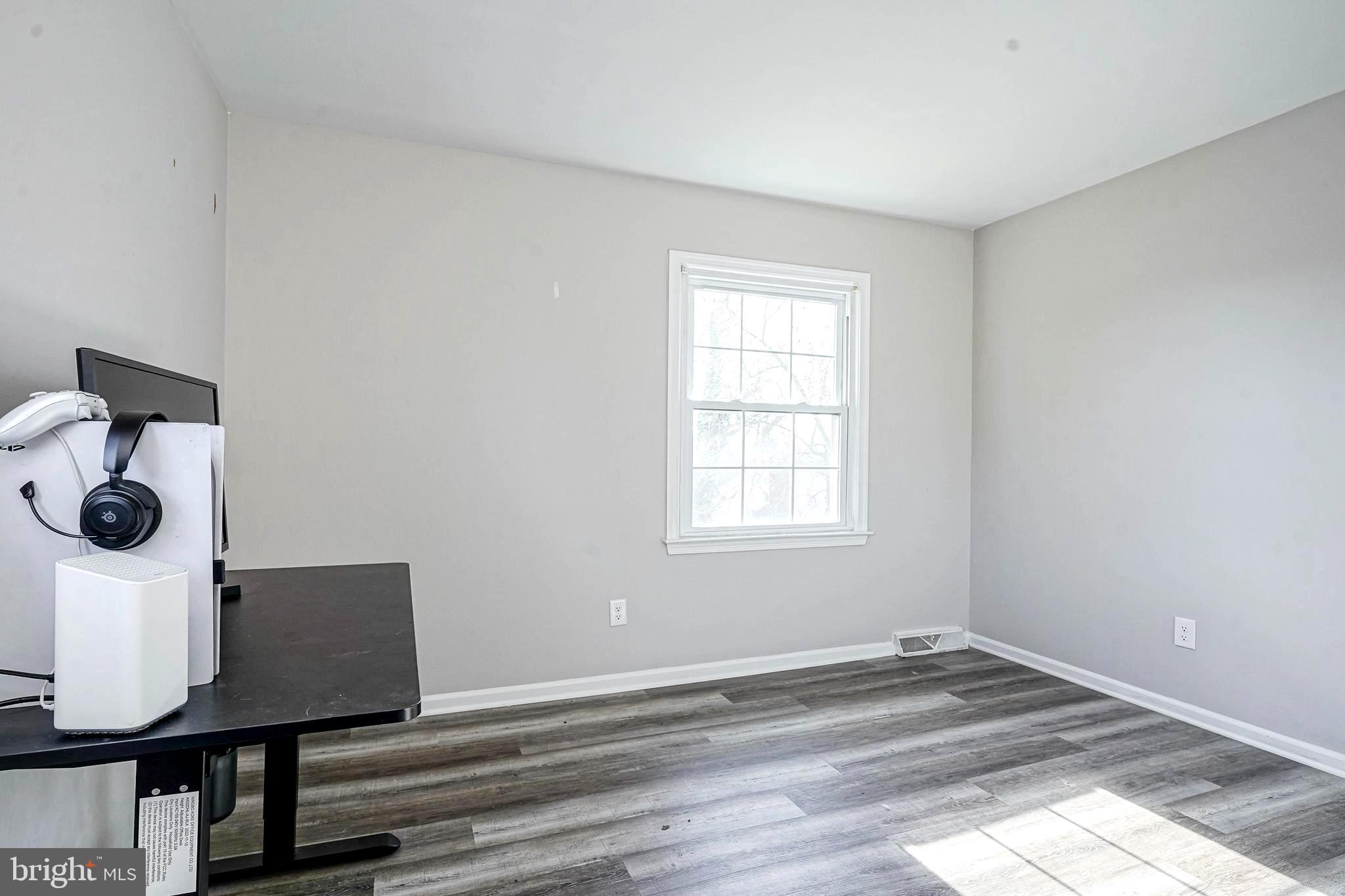 30 Tool Lane Williamstown, NJ 08094 - Photo 25 of 38 a view of empty room with wooden floor