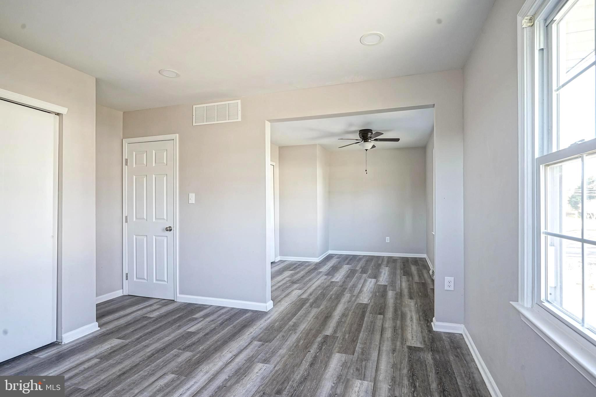 30 Tool Lane Williamstown, NJ 08094 - Photo 28 of 38 wooden floor in an empty room with a window