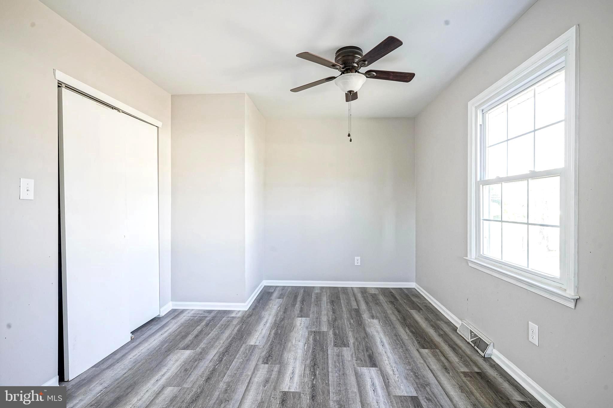 30 Tool Lane Williamstown, NJ 08094 - Photo 30 of 38 wooden floor in an empty room with a window