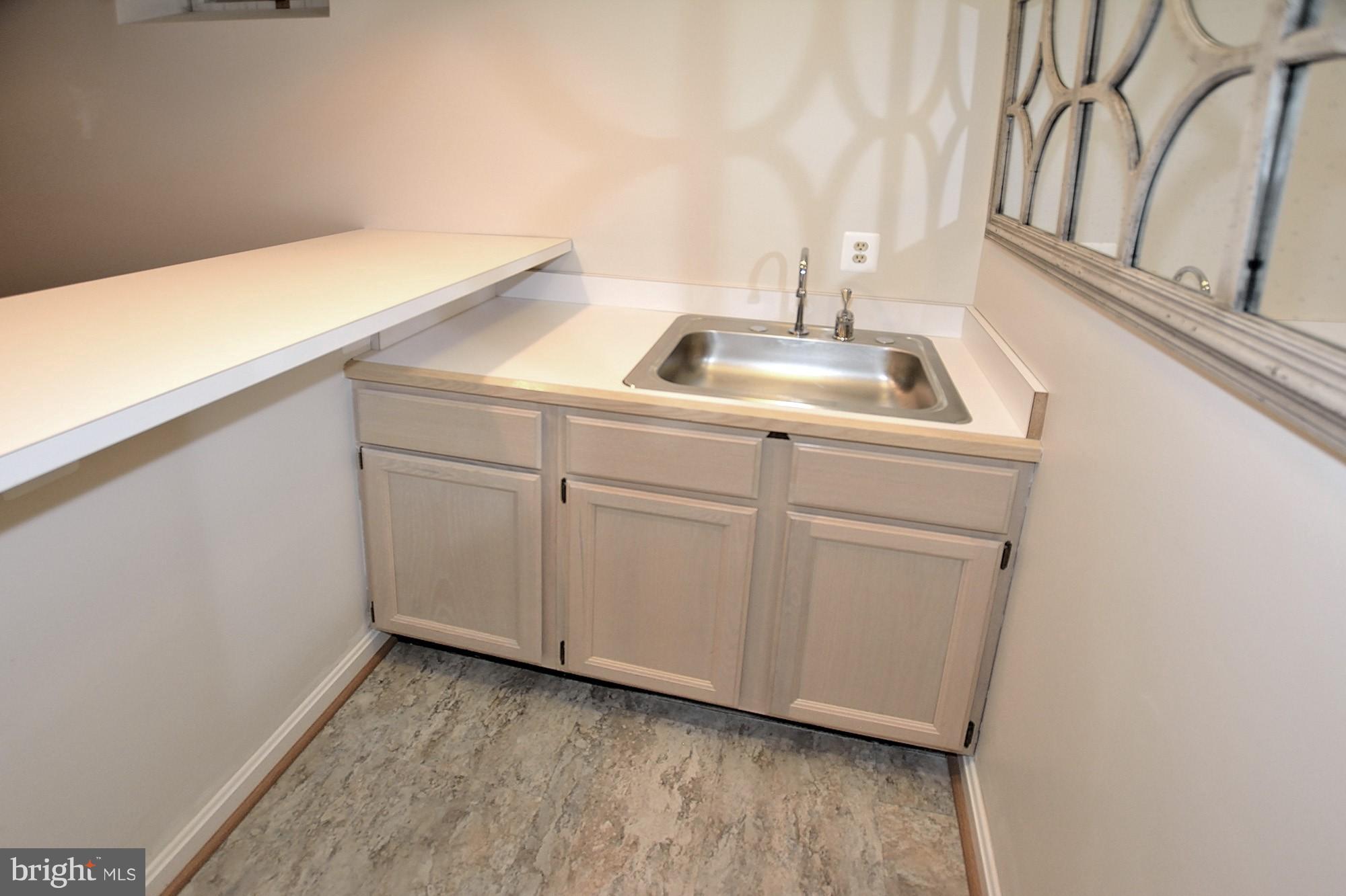 107 Rector Street Sterling, VA 20164 - Photo 25 of 29 Rec room complete with wet bar
